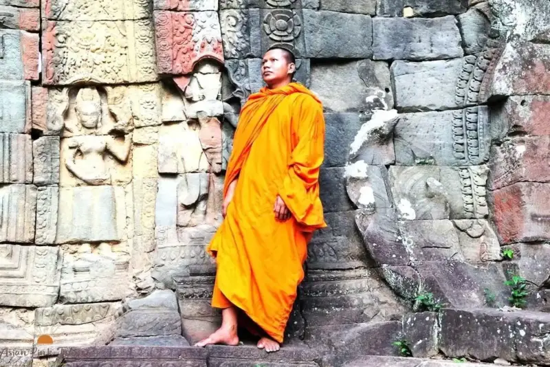 Cambodian Monk By Ancient Wall