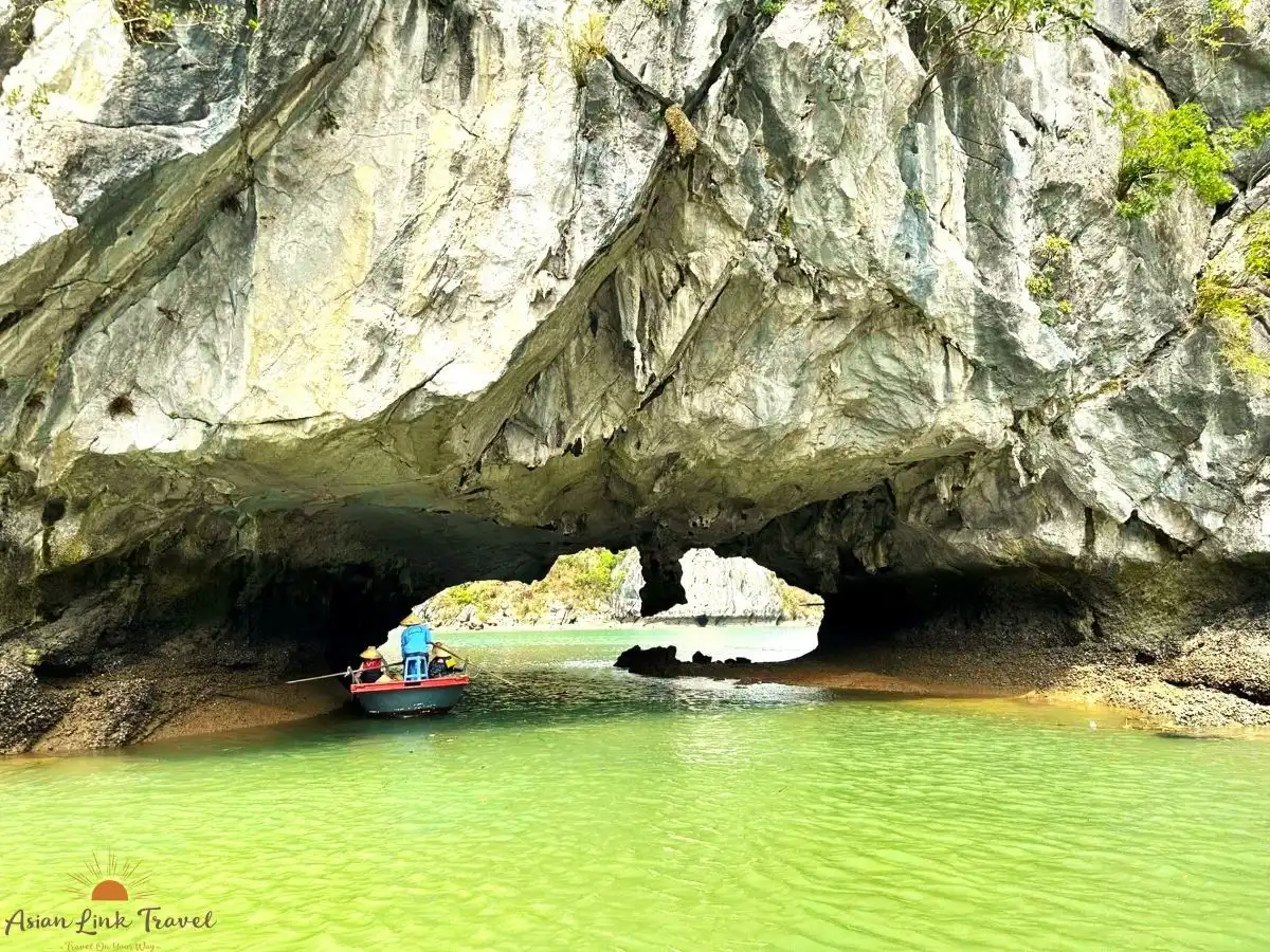 Luon Cave Boat Passing